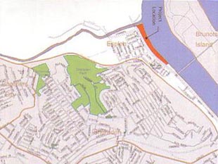 Area map showing streets. waterways and greenspace in vicinity of proposed park (red).
